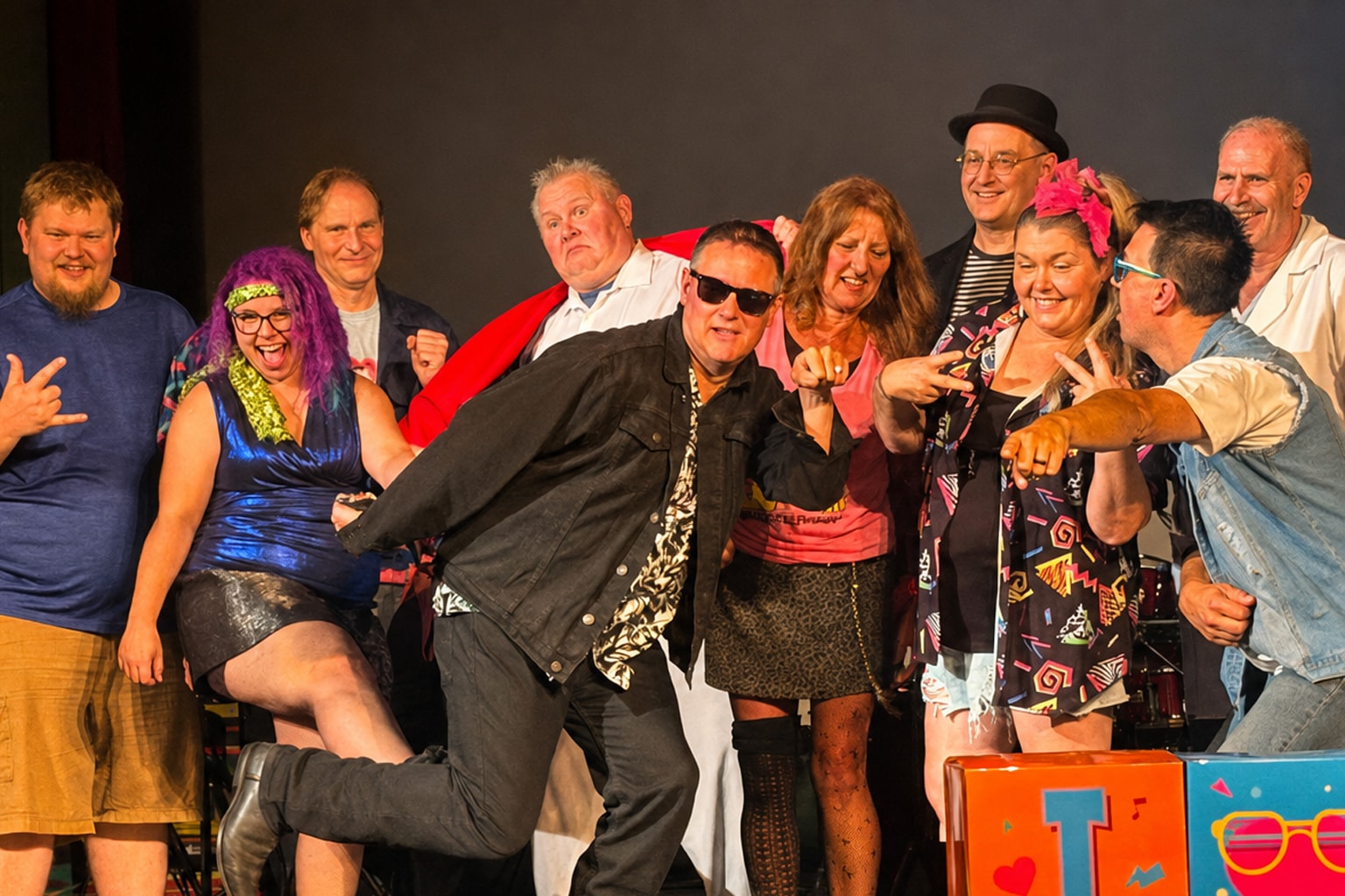 The full Transit Brothers Huey Lewis Experience cast and ensemble on stage